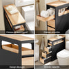 Espace de rangement multifonction : tiroirs pour organiser articles de toilette, papier et produits de nettoyage, avec un compartiment ouvert pour un accès facile.